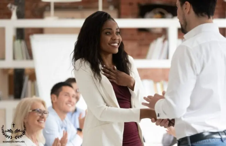 Christian business leader shaking hands with an employee