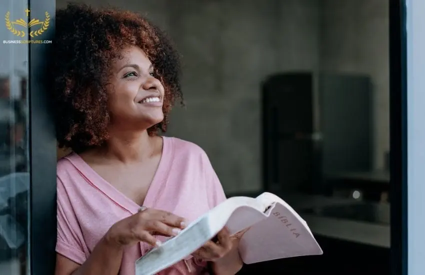 Christian entrepreneur reading bible verses about minding your business on Business Scriptures.